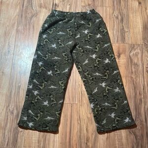 Dark green dinosaur pajama pants. (No rips or stains)